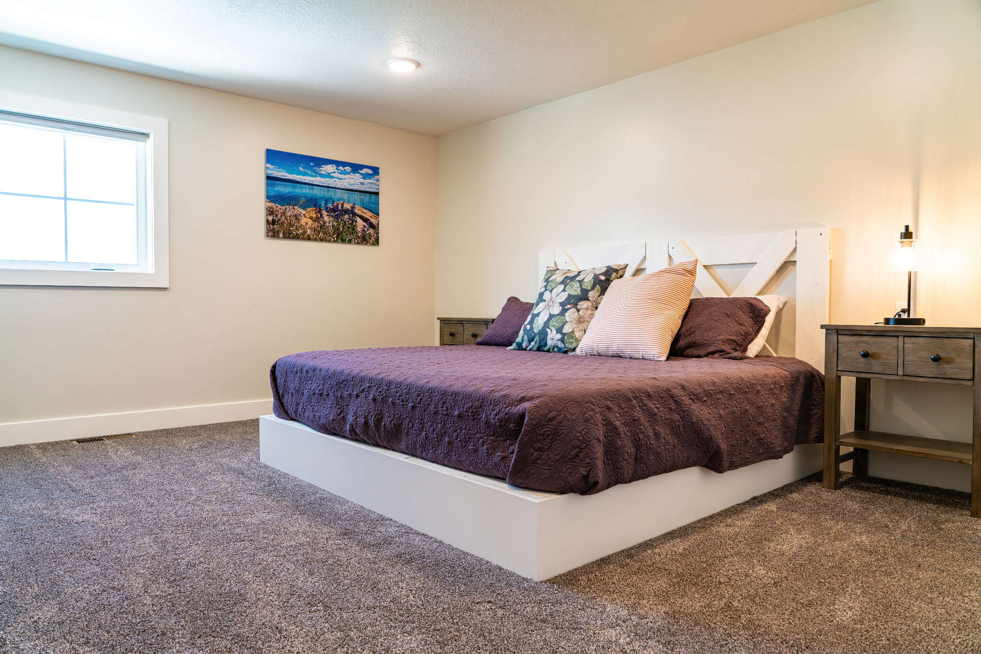 Carpeted bedroom with baseboards