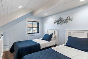Bedroom with recessed lighting, carpet, and wooden ceiling