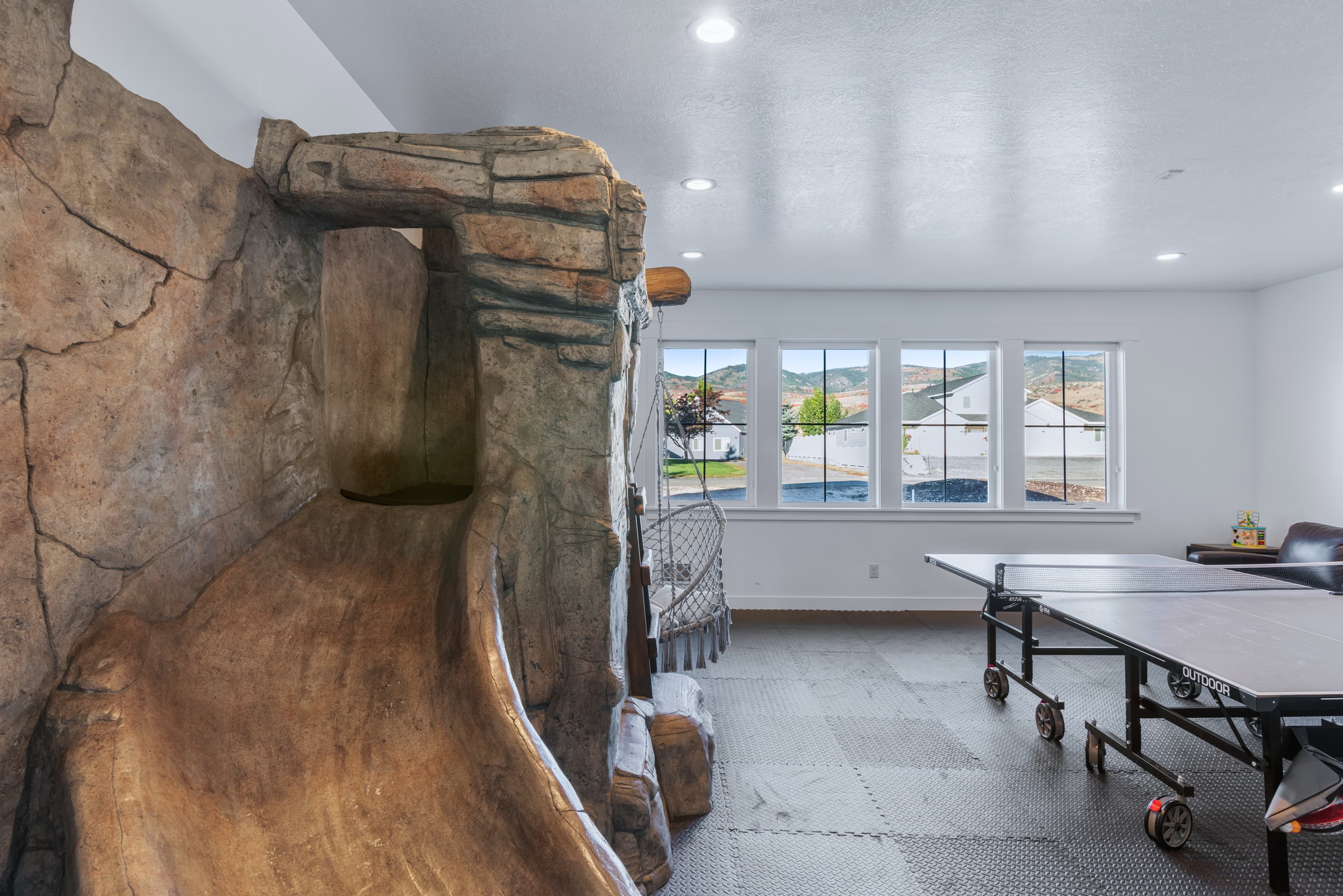 Dining area with recessed lighting and baseboards