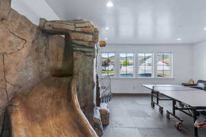 Dining area with recessed lighting and baseboards