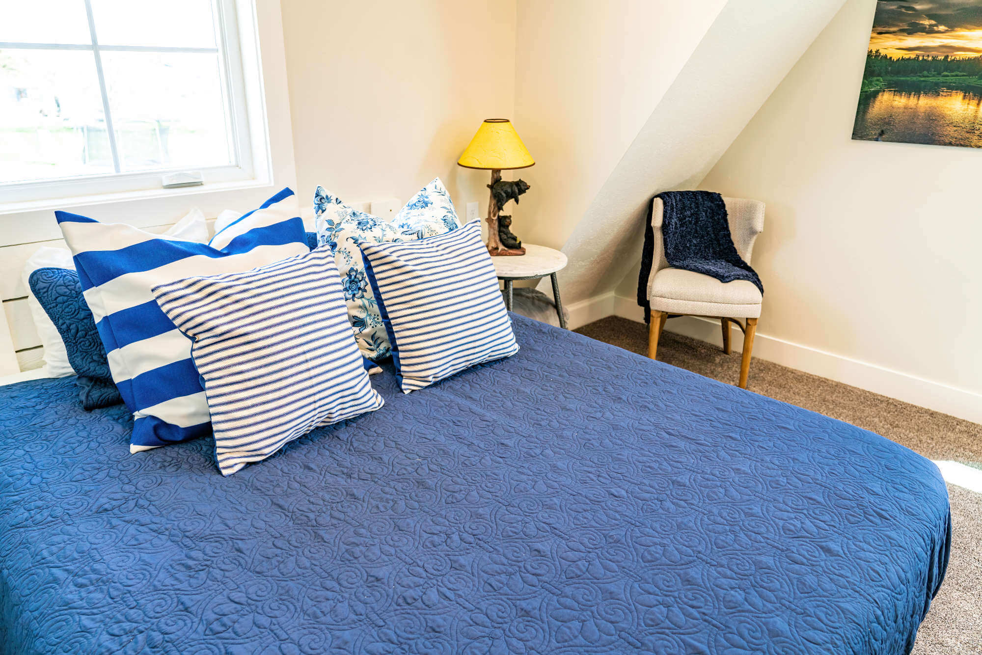 Carpeted bedroom featuring baseboards