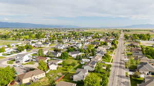 Aerial view of residential area with a mountainous background