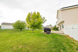 View of yard with a patio