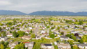 Aerial view of residential area with mountains