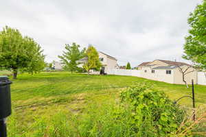View of yard featuring an outdoor structure