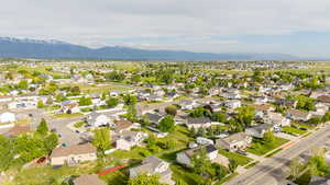 Aerial view of residential area with a mountain backdrop