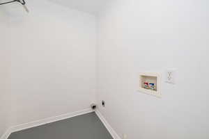 Laundry room with washer hookup, electric dryer hookup, and baseboards