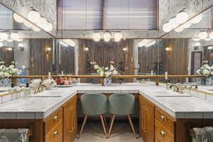 Bathroom featuring double vanity