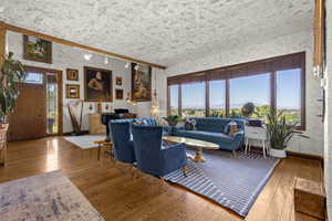 Living area featuring hardwood / wood-style floors