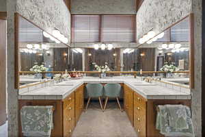 Bathroom featuring double vanity
