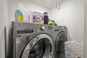 Laundry room featuring washer and dryer