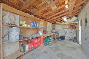 Garage featuring a workshop area
