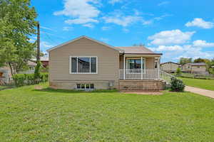 Bungalow-style home featuring covered porch