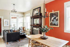 Dining room with a chandelier and wood finished floors