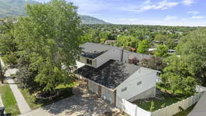 View of subject property with a mountain backdrop