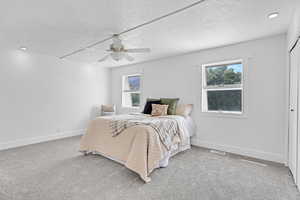 Primary Bedroom with En Suite Bathroom and Two Closets