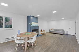 Second Living Space with Gas Fireplace and a Sliding Glass Door to the Backyard