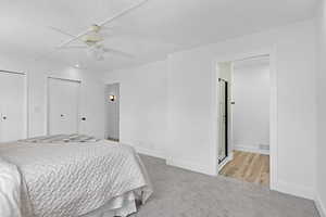 Primary Bedroom with En Suite Bathroom and Two Closets