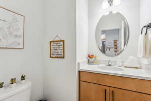 Bathroom with toilet and vanity