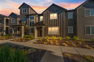 View of front of home with board and batten siding