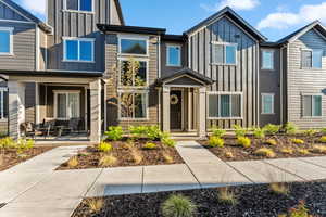 View of front facade featuring board and batten siding