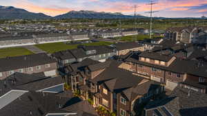 Aerial view at dusk of a mountain view and a residential view