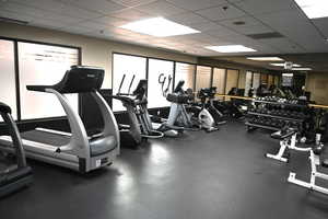 Workout area featuring a paneled ceiling