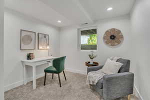 Carpeted home office featuring baseboards and recessed lighting