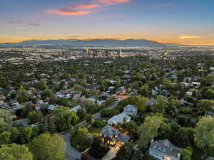 Aerial view of property's location with a mountain backdrop