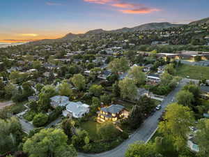 Aerial view of property's location with a mountain backdrop