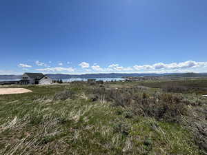 View of mountain background featuring a large body of water