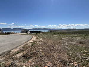 View of street featuring a water and mountain view