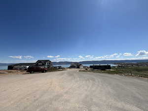 View of asphalt street with a water view