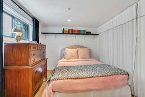 Bedroom with baseboards and recessed lighting