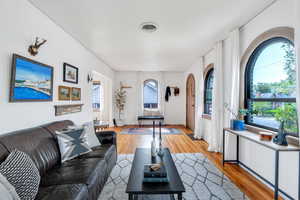 Living room featuring light wood-style flooring