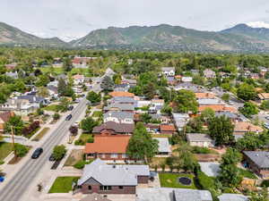 Aerial view of residential area with a mountainous background