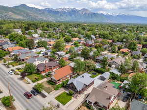Aerial view of residential area featuring a mountain backdrop