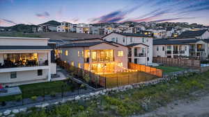 Back of property with a residential view and a fenced backyard