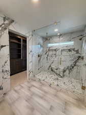 The owners en suite bath room shower comes equipped with two shower heads