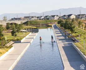 View of community with a residential view and a water and mountain view in your backyard.