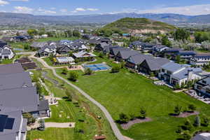 Aerial view of residential area featuring mountains