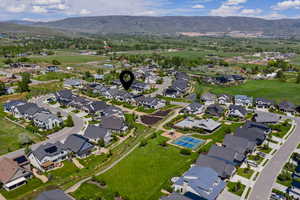 View of property location with a mountainous background and nearby suburban area