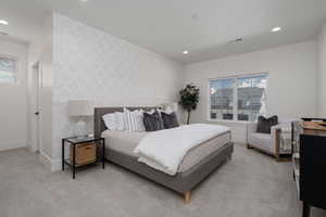 Bedroom featuring wallpapered walls, carpet floors, baseboards, and recessed lighting