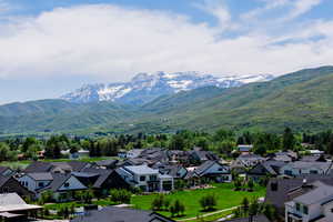 Mountain view featuring nearby suburban area