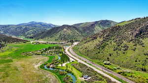 View of mountain background featuring a nearby body of water