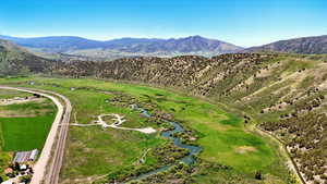 Drone / aerial view of a mountain backdrop