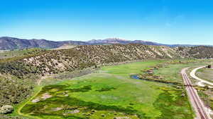 Drone / aerial view of a mountainous background