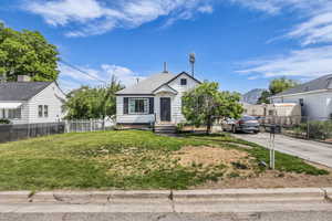 Bungalow-style house featuring driveway and a mountain view