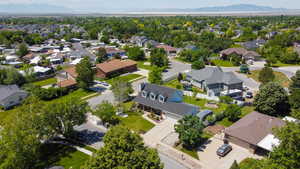 Aerial view of residential area featuring mountains