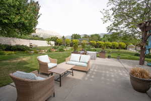 View of patio / terrace featuring a mountain view and outdoor lounge area